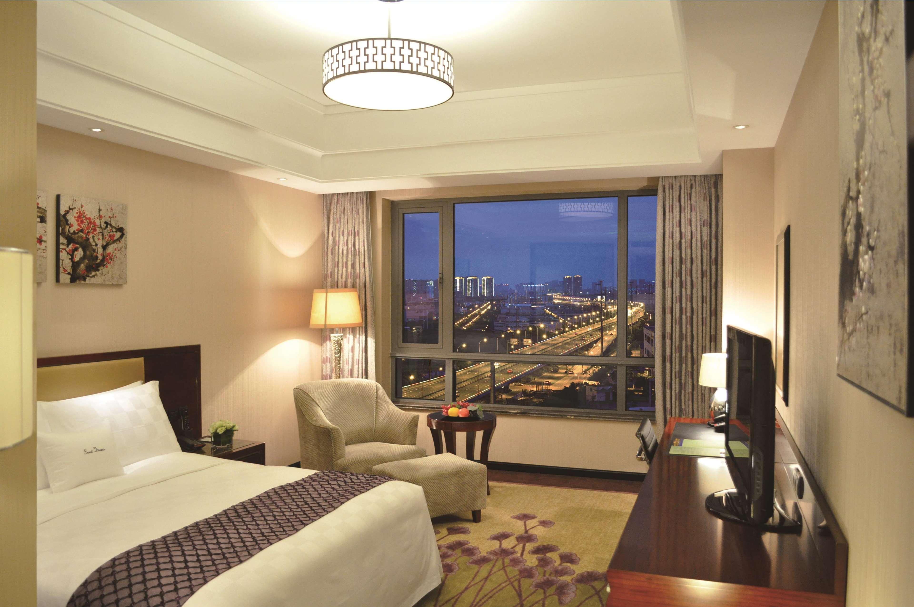 Doubletree By Hilton Wuxi Hotel Vuhszi Szoba fotó
