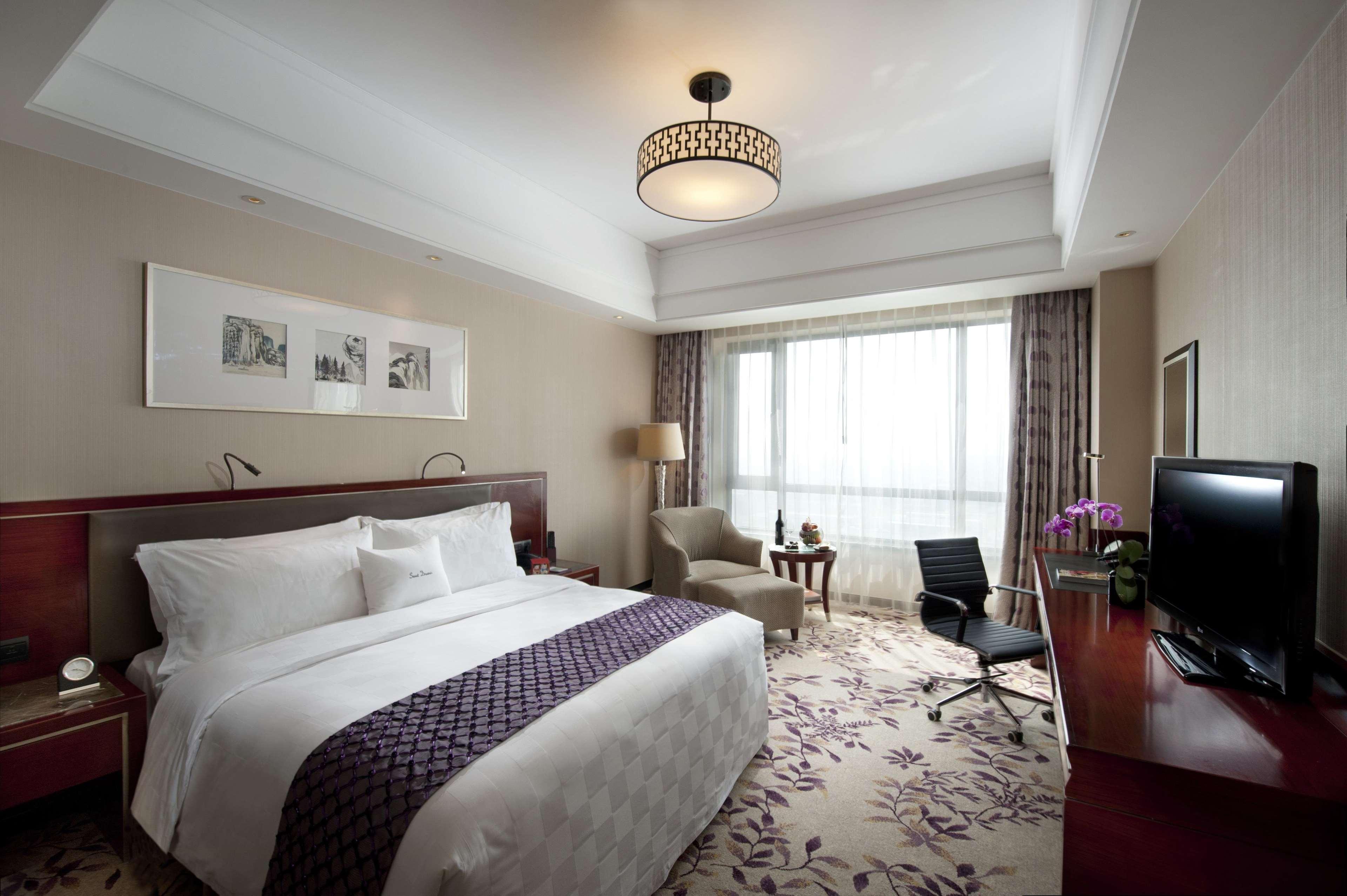 Doubletree By Hilton Wuxi Hotel Vuhszi Szoba fotó
